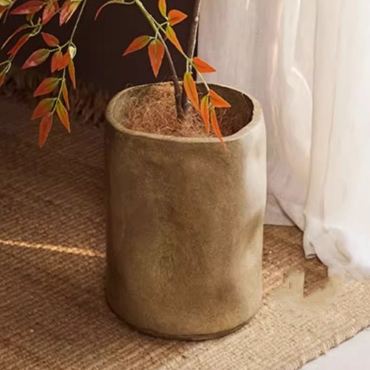 Modern Magnesium Planter by RusticReach, cylindrical metal planter with orange-leaf plant on Tampa Home & Garden Store