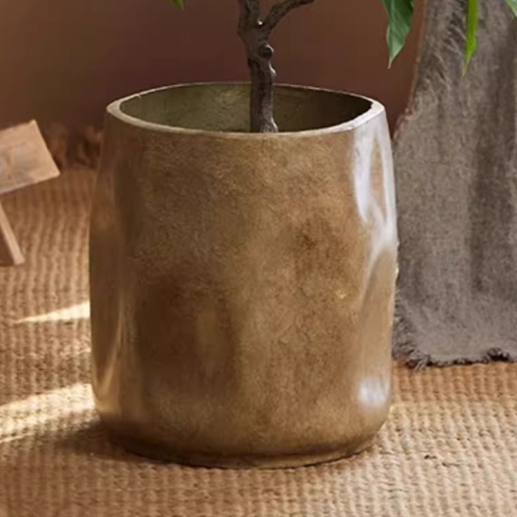 Modern Magnesium Planter by RusticReach, bronze-gold cylindrical pot on a jute rug on Tampa Home & Garden Store