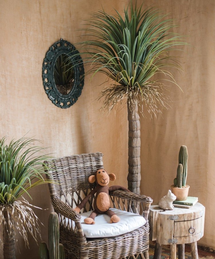 RusticReach Moroccan Artificial Palm Tree in Pot with wicker chair and wood table in beige nook on Tampa Home & Garden Store