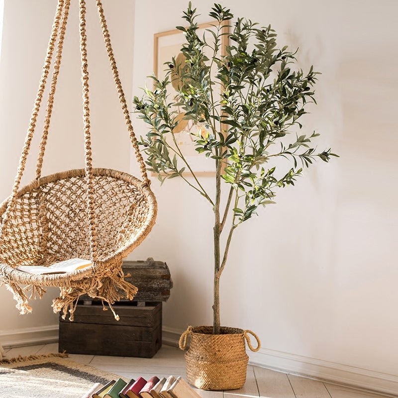 Artificial Silk Faux Olive Tree in Pot by RusticReach, green leaves in a woven basket on Tampa Home & Garden Store