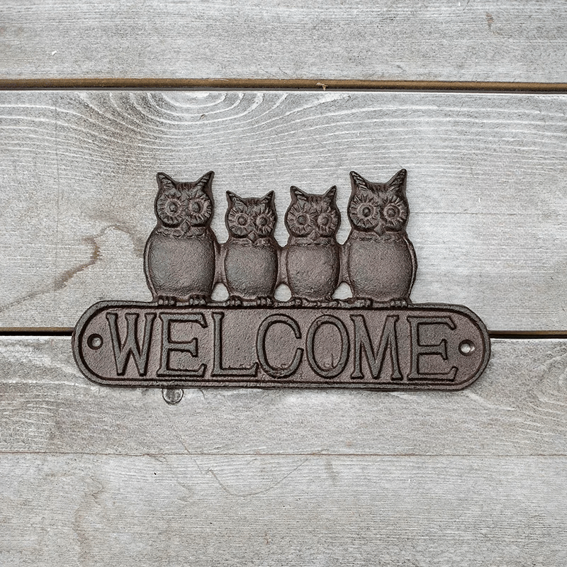 Four Owls Cast Iron Welcome Sign by RusticReach; brown plaque with four owl figures on Tampa Home & Garden Store