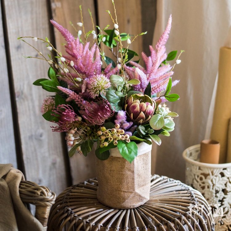 Paper Bag Style Concrete Garden Pot by RusticReach with pink dried bouquet on a woven rattan table on Tampa Home & Garden Store