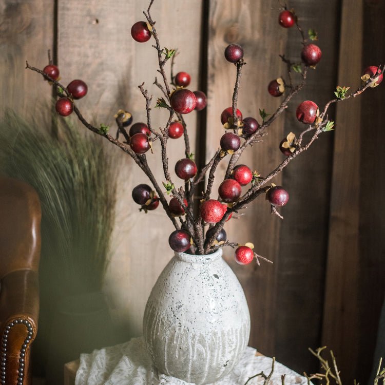 Artificial passion fruit stem in a white vase with red berries, 37 inches tall on Tampa Home & Garden Store