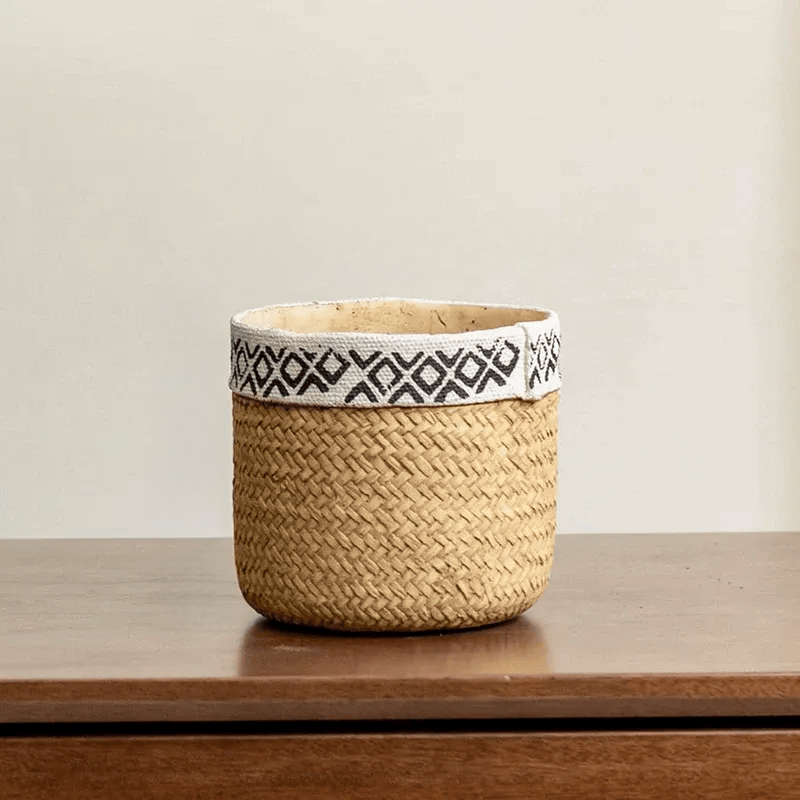 Patterned Rattan Cement Planter, natural woven body with black rim on Tampa Home & Garden Store