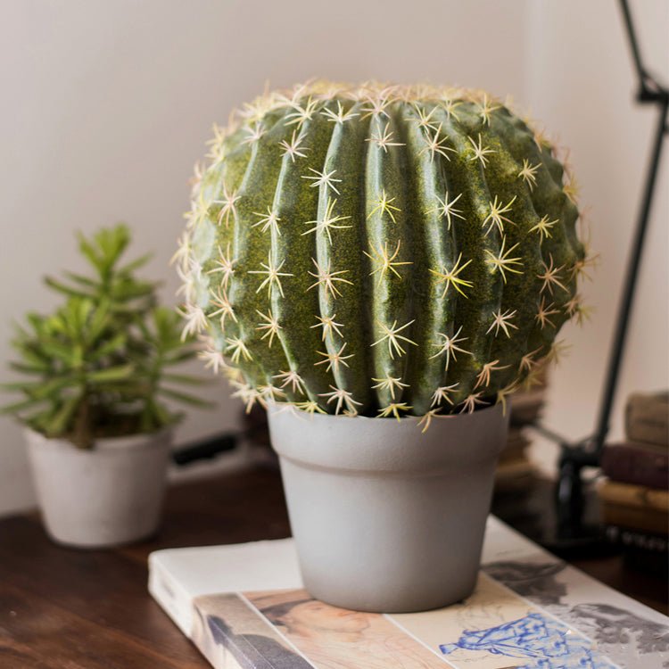 Artificial faux cactus ball in pot, green ribbed sphere with white spines in gray planter on Tampa Home & Garden Store