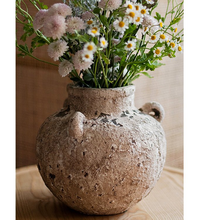 Stoneware vase by RusticReach with weathered finish and two handles, holds dried daisies on Tampa Home & Garden Store