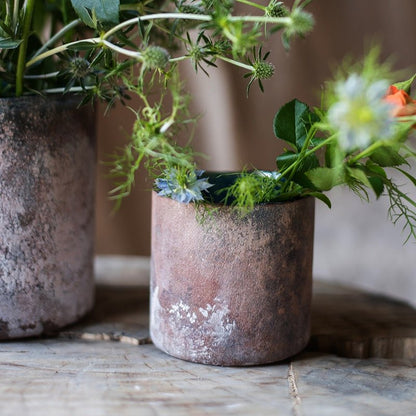 Rust Style Art Glass Vase by RusticReach; two rusted metal vases with patina and greenery on Tampa Home & Garden Store