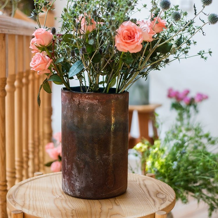 Rust Style Art Glass Vase by RusticReach, rust-toned metal vase with pink roses on Tampa Home & Garden Store
