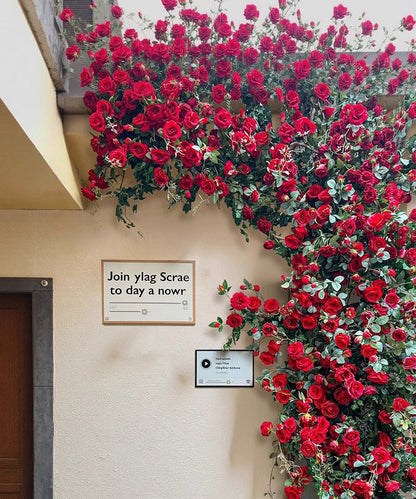 Artificial Red Rose Climbing Garland for Walls by RusticReach with red roses and green foliage on Tampa Home & Garden Store