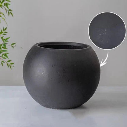 Round Magnesium Clay Planter by RusticReach, dark charcoal gray, matte finish on Tampa Home & Garden Store