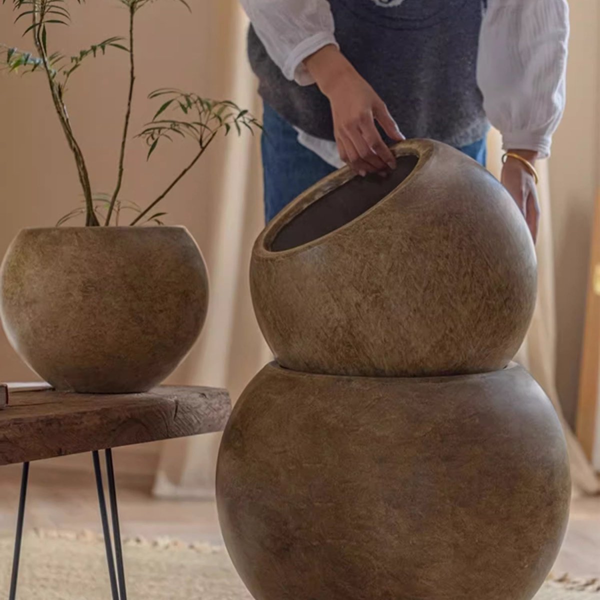 Round Magnesium Clay Planter by RusticReach; brown spherical pots, two stacked, one with a plant on Tampa Home & Garden Store