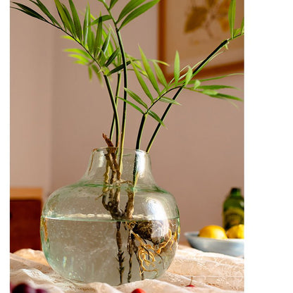Faux rooted Murdannia leaf bunch in a clear glass vase with roots, RusticReach 23in tall on Tampa Home & Garden Store