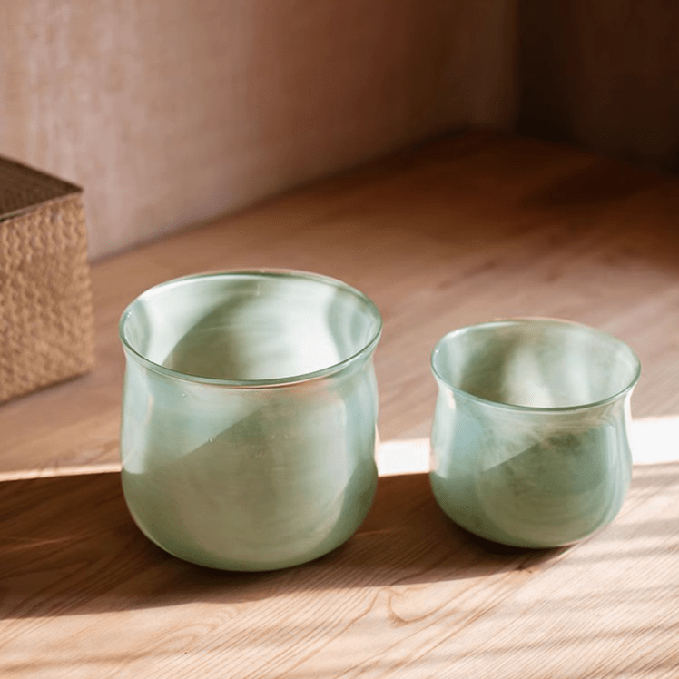 Ruhai Low Glass Vase by RusticReach, seafoam green glass, large and small duo on a wood floor on Tampa Home & Garden Store