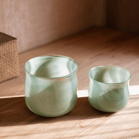 Ruhai Low Glass Vase by RusticReach, seafoam green glass, large and small duo on a wood floor on Tampa Home & Garden Store