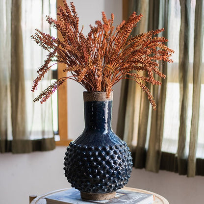 Large navy blue Domo coarse pottery vase with bubble texture and tan neck, dried stems on Tampa Home & Garden Store