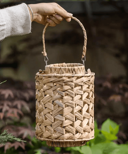 Rustic Seagrass handwoven candle lantern by RusticReach, natural beige with braided handle on Tampa Home & Garden Store