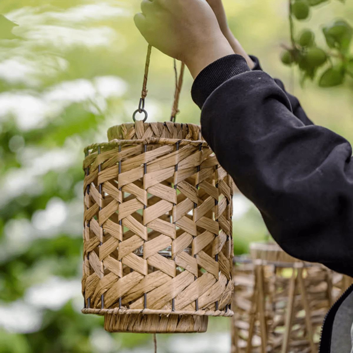 Rustic Seagrass Handwoven Candle Lantern, natural tan with woven pattern and hanging cord on Tampa Home & Garden Store