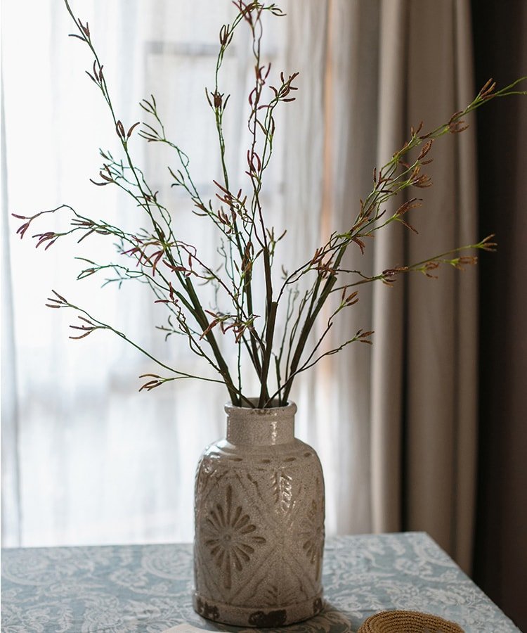 RusticReach artificial Japanese Zen sedge stems in a beige ceramic vase on Tampa Home & Garden Store