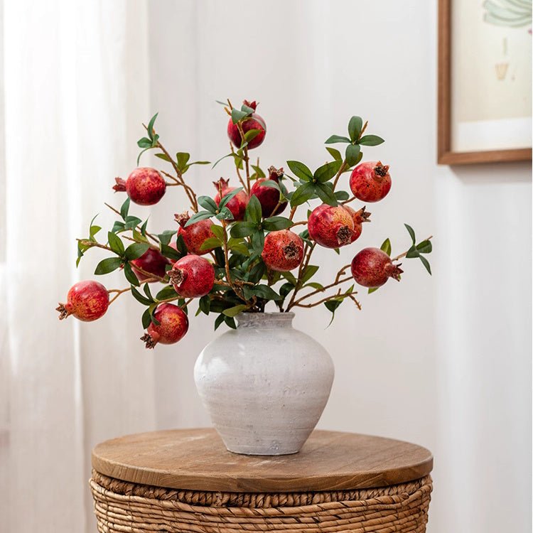 Faux Pomegranate Stem 15 in tall with red pomegranates and green leaves in ceramic vase on Tampa Home & Garden Store