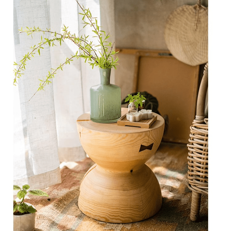 Solid wood natural end table by RusticReach with hourglass silhouette and green ceramic vase on Tampa Home & Garden Store