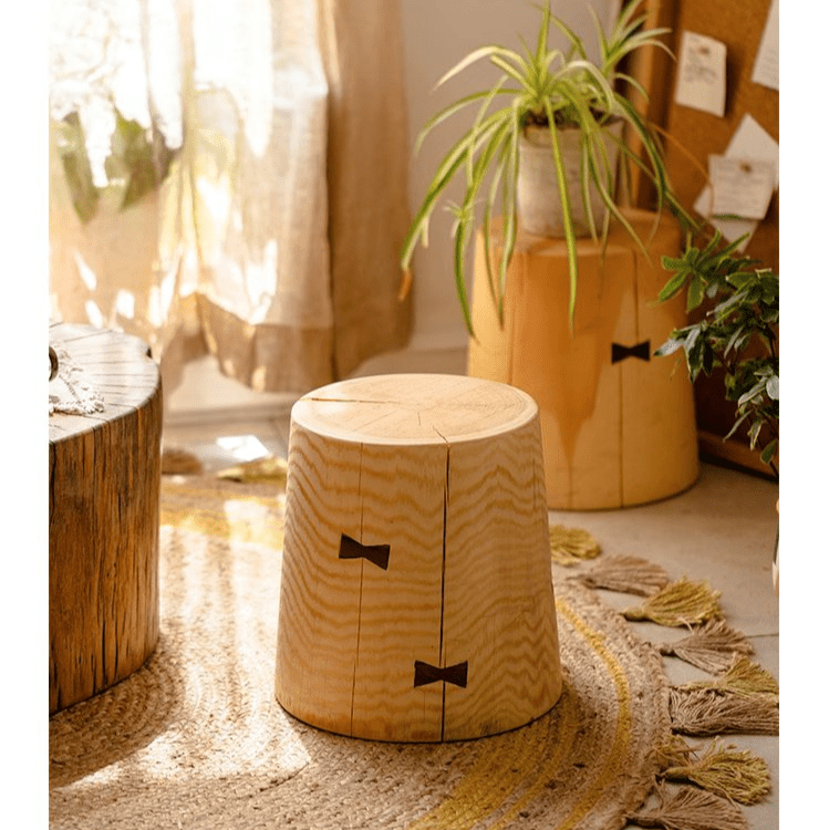 Solid Wood End Table RusticReach, natural-finish cylindrical stump with bow-tie joinery on Tampa Home & Garden Store