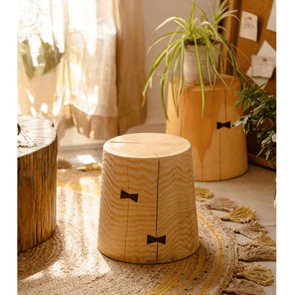 Solid Wood End Table RusticReach, natural-finish cylindrical stump with bow-tie joinery on Tampa Home & Garden Store