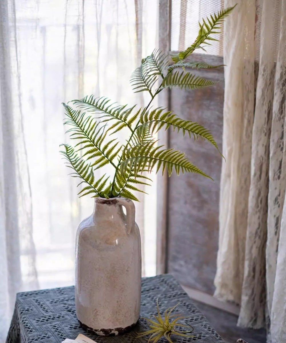 RusticReach Artificial Tall Fern Leaf Stem in a beige ceramic vase with green fronds on Tampa Home & Garden Store