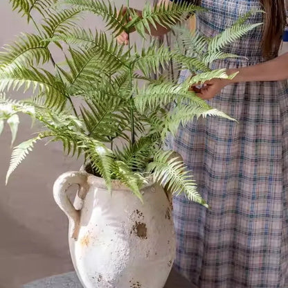 Artificial Tall Fern Leaf Stem by RusticReach with lush green fronds in a white ceramic vase on Tampa Home & Garden Store