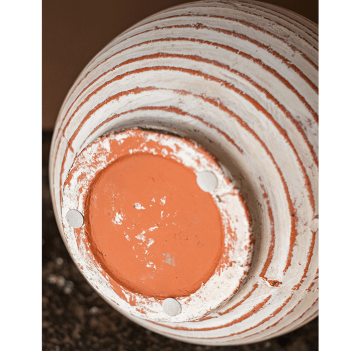 Terracotta planter vase by RusticReach with orange glaze and white striped rings, bottom on Tampa Home & Garden Store