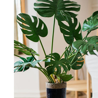 Artificial Turtle Leaf Stem Bunch with green Monstera leaves in a dark pot on Tampa Home & Garden Store