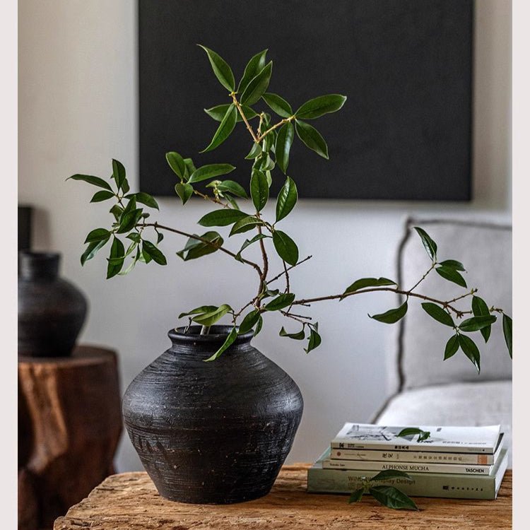 Vintage Wabi-Sabi ceramic jar by RusticReach with dark glaze and bulbous silhouette on Tampa Home & Garden Store