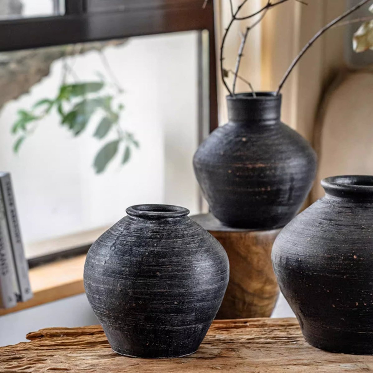 Vintage Wabi-Sabi ceramic jars in black with a textured rustic finish, set of 3 on wood surface on Tampa Home & Garden Store