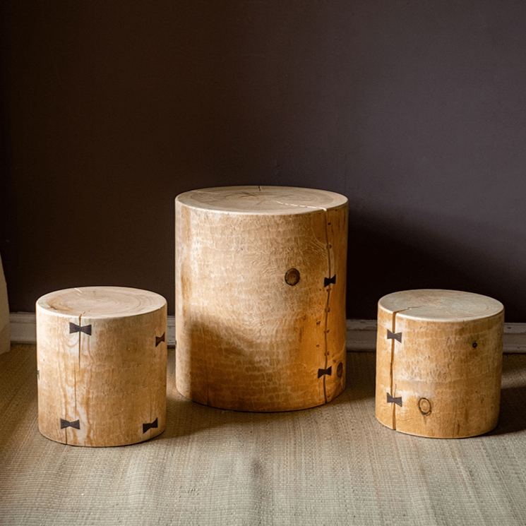 Pine wood pedestal tables set of three with natural finish and black hinge accents on Tampa Home & Garden Store