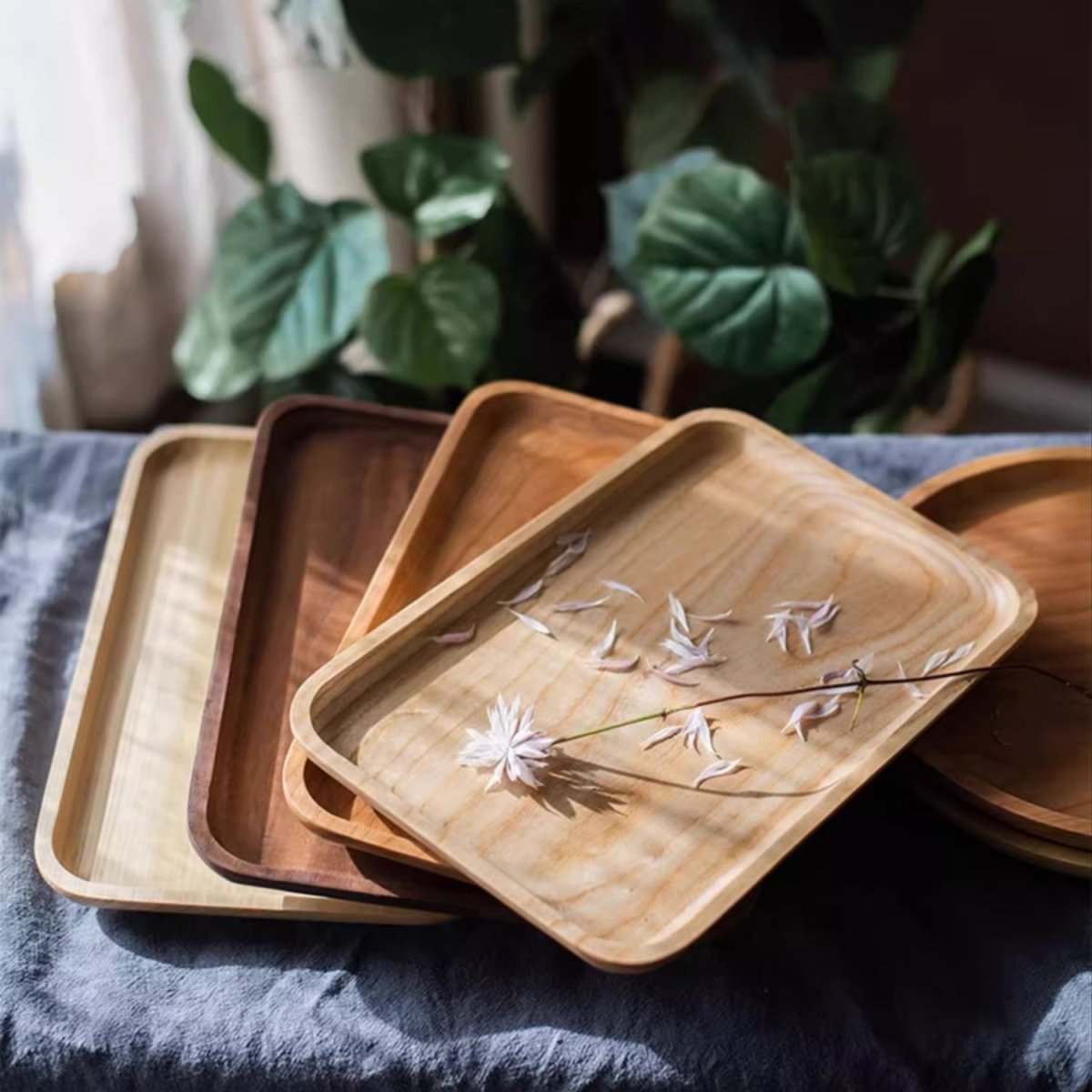 Natural wood plate serving tray set of 4 in light to medium tones RusticReach platters on Tampa Home & Garden Store