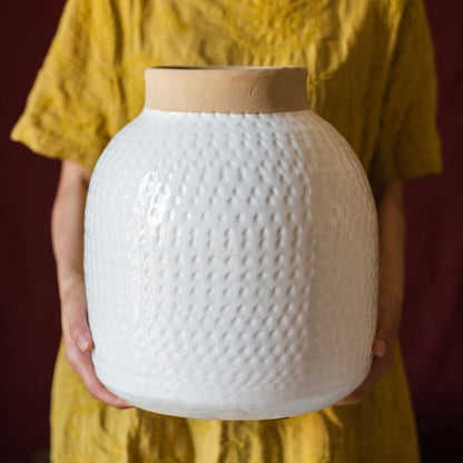 White glazed ceramic vase by RusticReach with dotted texture and rounded silhouette on Tampa Home & Garden Store