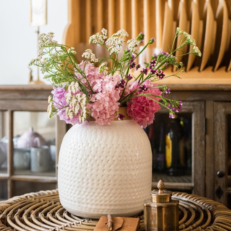 White glazed ceramic textured flower vase by RusticReach with pink and white blooms on Tampa Home & Garden Store