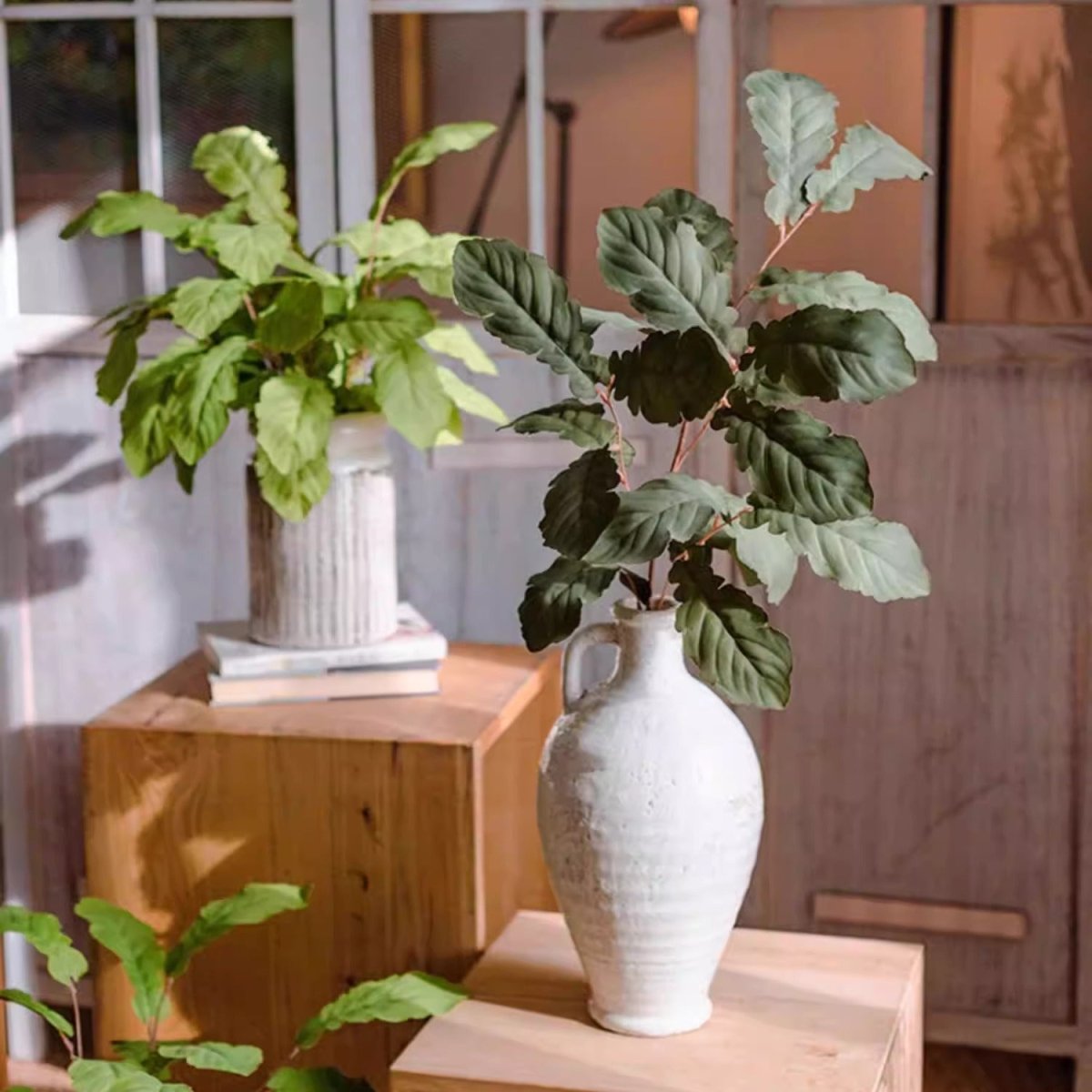 Wild Garden Greenery Stem 36in artificial plant in a white vase with dark green leaves on Tampa Home & Garden Store