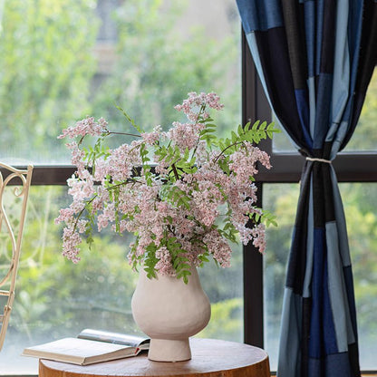 Enchanted Garden Wisteria Stem 51in artificial plant in a cream vase with pink blossoms on Tampa Home & Garden Store
