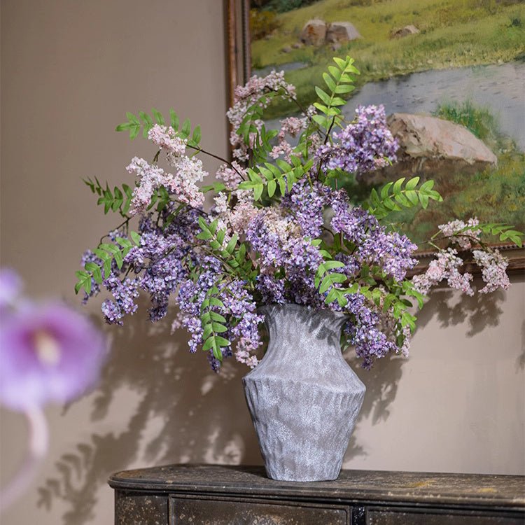 Enchanted Garden Wisteria Stem 51in tall in a gray vase with purple blooms and green leaves on Tampa Home & Garden Store