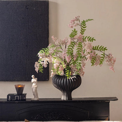 Enchanted Garden Wisteria Stem 51-in faux plant in black vase with pink blooms on Tampa Home & Garden Store