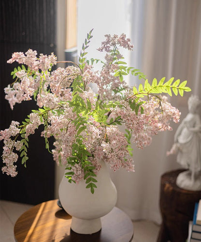 Enchanted Garden Wisteria Stem, 51in faux plant with pink blooms and green leaves in white vase on Tampa Home & Garden Store