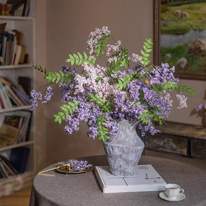 Enchanted Garden Wisteria Stem 51in tall lavender blossoms with green leaves in a gray vase on Tampa Home & Garden Store