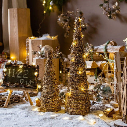 Christmas Rattan Cone Tree in Gold by RusticReach; pair of gold cone trees with warm lights on Tampa Home & Garden Store