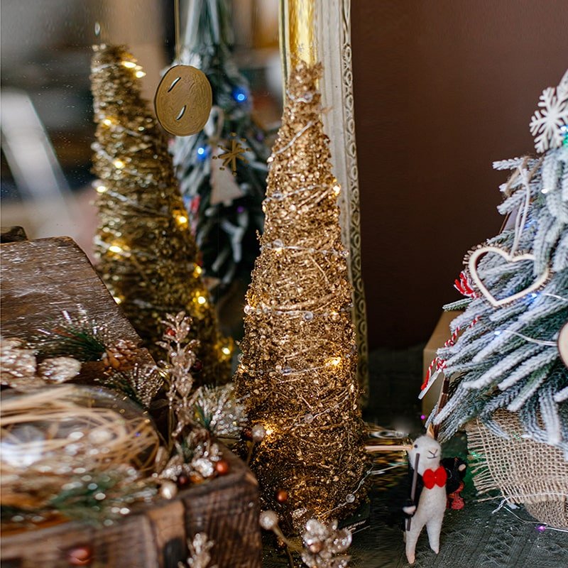Christmas Rattan Cone Tree in Gold by RusticReach with glittering finish and string lights on Tampa Home & Garden Store