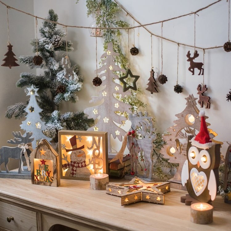 Wooden Christmas desktop figurines by RusticReach featuring carved trees, stars and an owl decor set on Tampa Home & Garden Store
