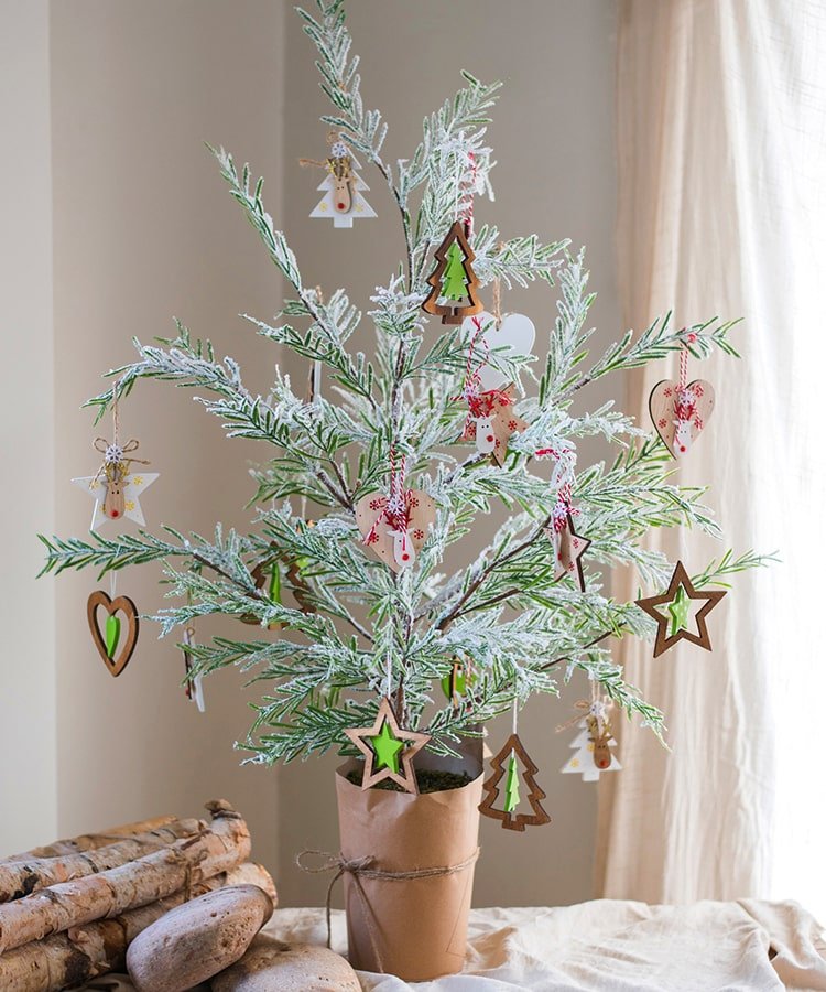 Cedar Fir Snowflocked Christmas Tree in paper-wrapped base with wooden ornaments RusticReach on Tampa Home & Garden Store