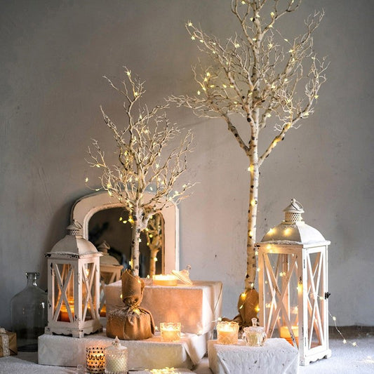 RusticReach Christmas Withered White Faux Tree pair with warm lights beside white lanterns on Tampa Home & Garden Store