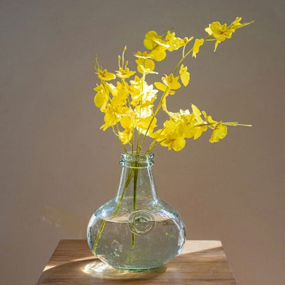 Faux Silk Yellow Dancing Lady Orchid Stem Bundle 19in tall in a glass vase on a wood table on Tampa Home & Garden Store