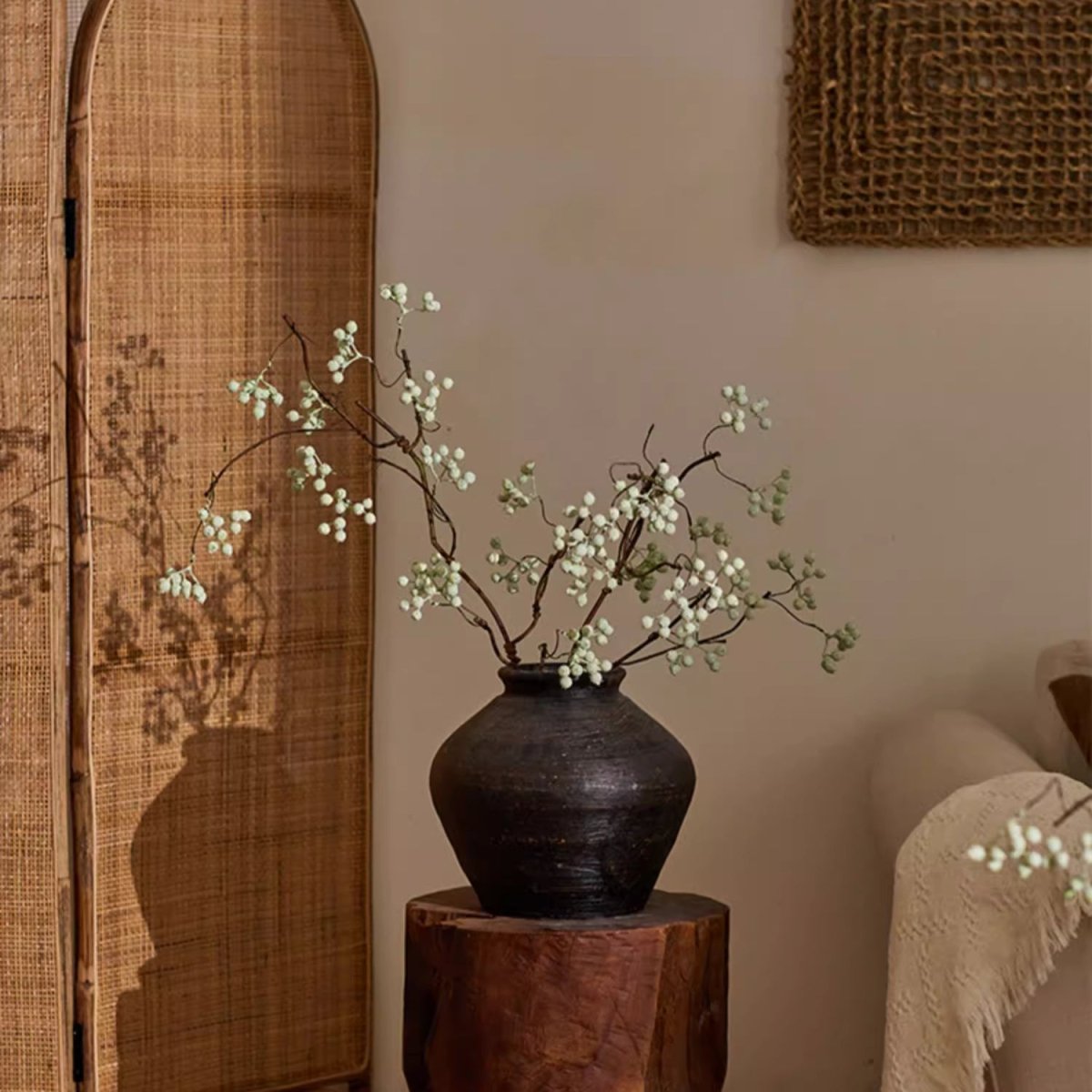 Zen Style light green berry stem RusticReach in a dark ceramic vase with twisting branches on Tampa Home & Garden Store