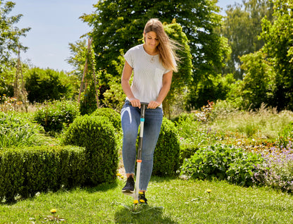Weed Puller Gardena hand tool for cultivators shown in a sunny garden on Tampa Home & Garden Store